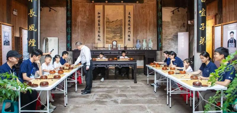 我县在洪家大屋举办围棋文化交流活动